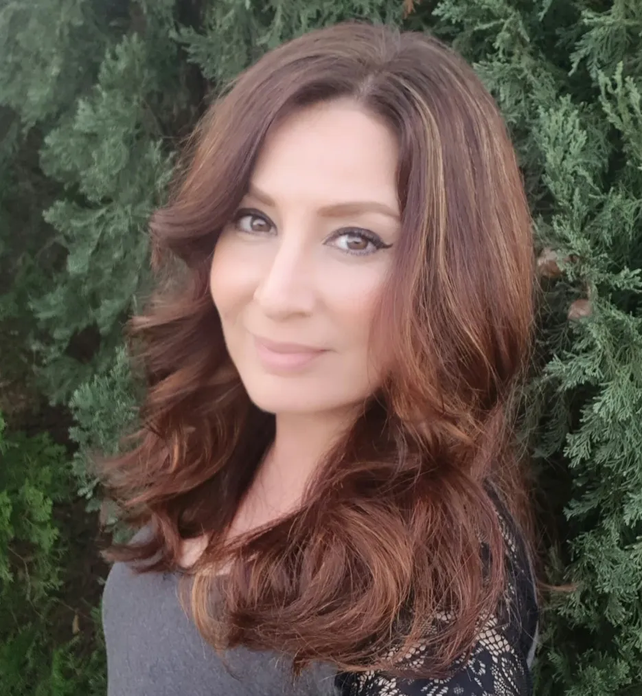 Ella Mizzi - Director